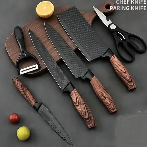 Conjunto de facas e utensílios de cozinha sobre fundo escuro